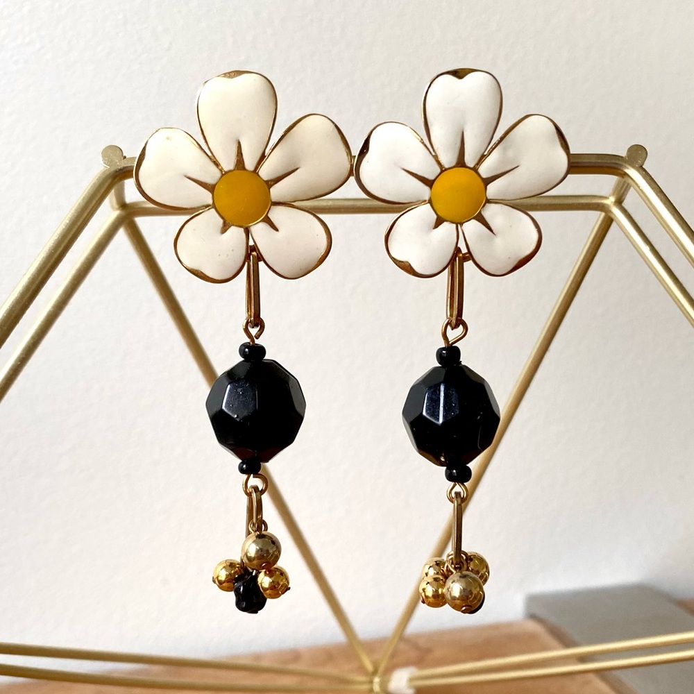 Redesigned flower clip on earring with dangling large and small beads